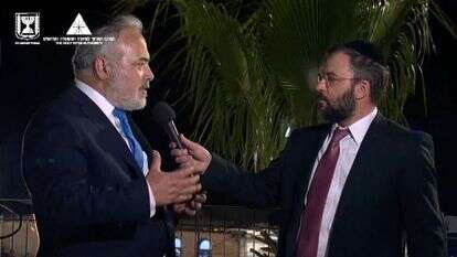 אבי מימרן ויוסי שווינגר במירון, זמן קצר לפני האסון. | מסך מתוך שידורי ההילולה בכאן מורשת