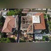 הבית שספג פגיעה ישירה באשקלון. | AFP