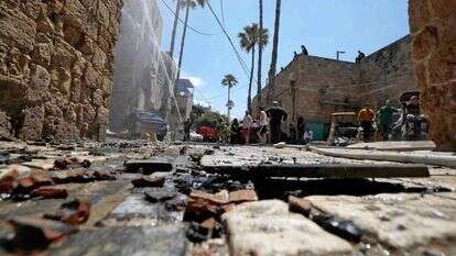 עכו אחרי הפרעות. | AFP