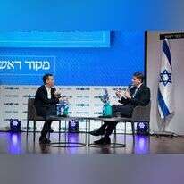 רון דרמר ועמית סגל בוועידת "עם עולם" של מקור ראשון. | שריה דיאמנט