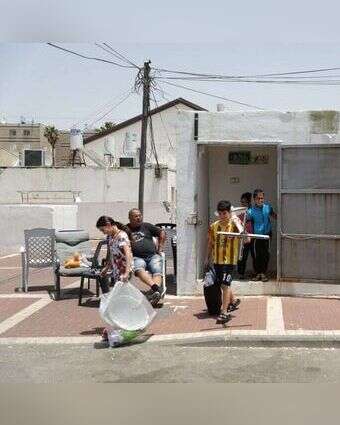 ילדים יוצאים ממקלט באשקלון. | EPA