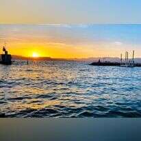 שקיעה במפגש הדייגים בנמל עין גב. | יעל שביט