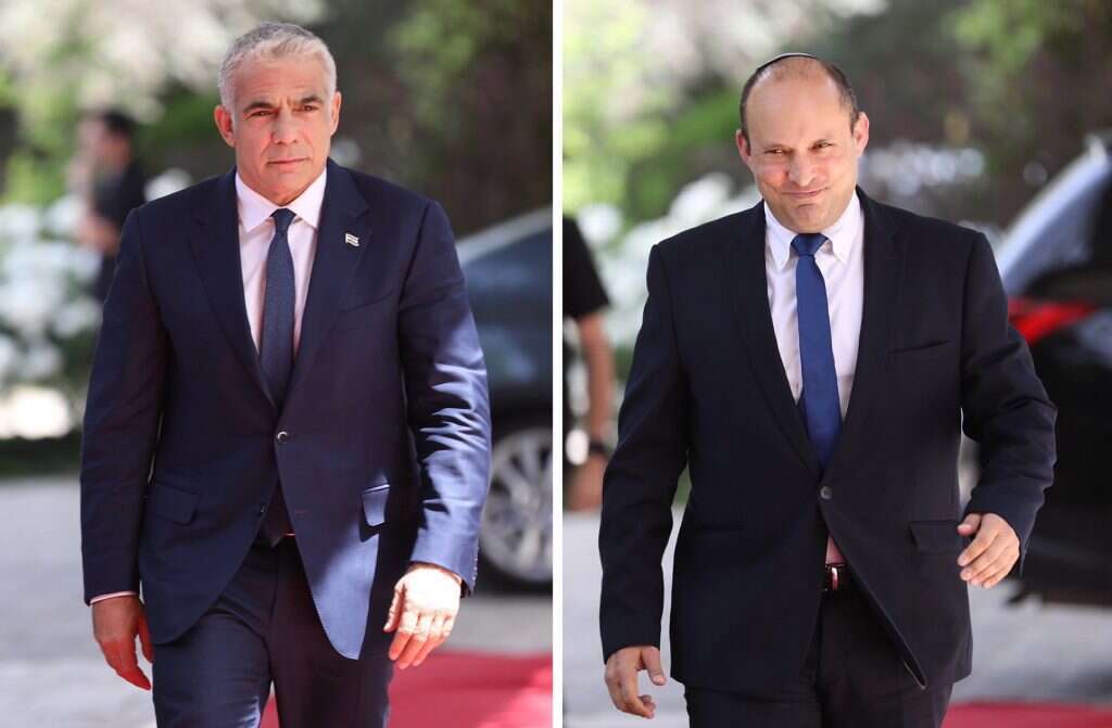 נפתלי בנט ויאיר לפיד. | EPA נפתלי בנט ויאיר לפיד. | EPA