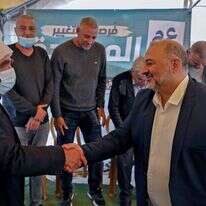 עבאס בביקור בכפר מע'אר, מרץ 2021. | AFP