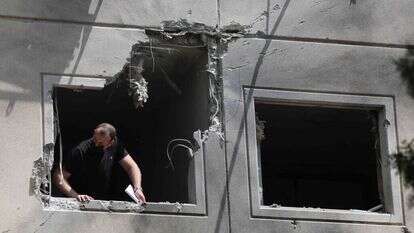 בית שספג פגיעה ישירה באשקלון. | AFP