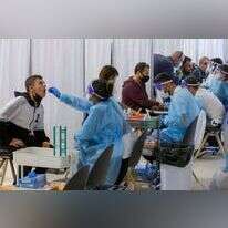 בדיקות קורונה בנתב"ג. | AFP