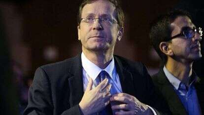 "אפשר להגיע להסכמות רחבות למרות הפערים וחילוקי הדעות", הנשיא הרצוג. | AFP