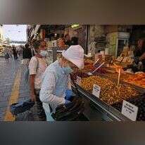 שוק מחנה יהודה בירושלים, יוני 2021. | AFP שוק מחנה יהודה בירושלים, יוני 2021. | AFP