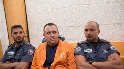 רומן זדורוב במשפטו, בשנת 2014. | יונתן זינדל, פלאש 90