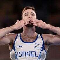 דולגופיאט לאחר הזכייה. | AFP