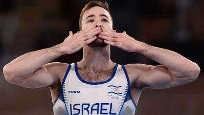 דולגופיאט לאחר הזכייה. | AFP