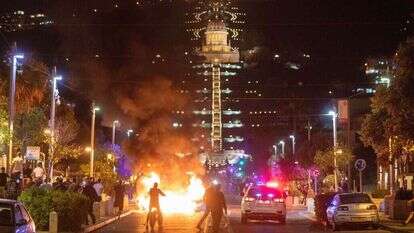 מהומות והצתת פחים בחיפה במהלך הפרעות. | מישל דוט קום