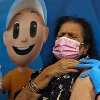 מתחסנים נגד הקורונה. | AFP