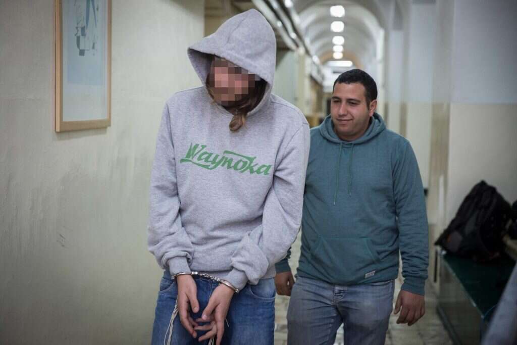 אחד הנאשמים במהלך מעצרו. | הדס פרוש - פלאש 90