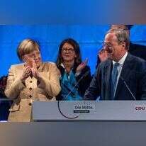 מרקל (משמאל) עם המועמד השמרני לקנצלרות ארמין לאשט. | AFP