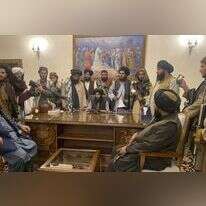 לוחמי הטליבן בארמון הנשיאותי. | AP