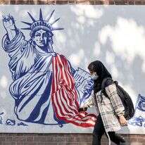 ציור קיר אנטי-אמריקני באיראן. | AFP