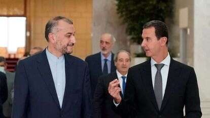 אסד עם שר החוץ האיראני, | EPA אסד עם שר החוץ האיראני, | EPA