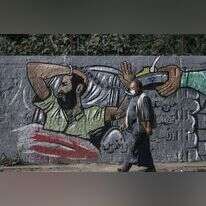 ציור קיר ברצועת עזה, המביע תמיכה באסיר שובת רעב. | AFP