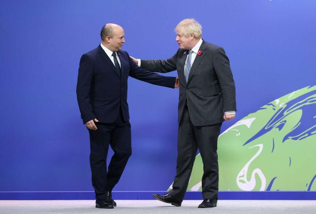 ראש הממשלה בנט וראש ממשלת בריטניה בוריס ג'ונסון בוועידת האקלים. | EPA