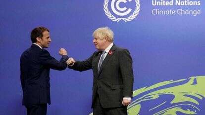 ג'ונסון ומקרון בוועידת האקלים. | AFP