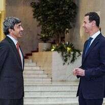 באשר אל אסד ושר החוץ האמירותי, עבדאללה בן זאיד אלנהיאן. | AFP