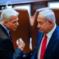 נתניהו ולפיד במליאת הכנסת | אוליבייה פיטוסי/פלאש90