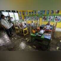 תוכנית פיילוט לחזרה ללימודים. בית ספר בפיליפינים. | AFP