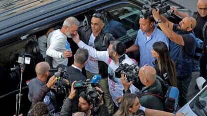 בני הזוג אוקנין בושבם לישראל. | AFP