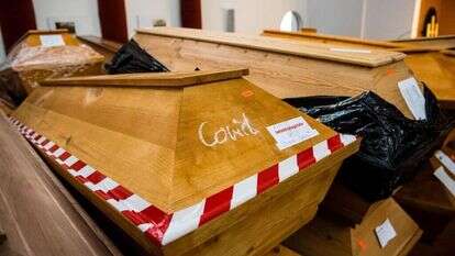 ארונות מתים של חולי קורונה בגרמניה. | AFP