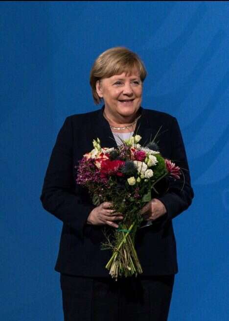 מרקל בטקס העברת השלטון. | : איי.אף.פי