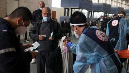 בדיקות קורונה בנתב"ג. | AFP