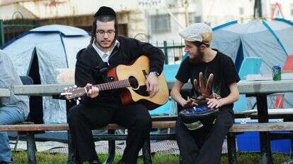 מנדי הכטמן, פלאש 90