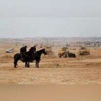 הטרקטורים של קק"ל מכשירים את השטח
לנטיעות, | AFP