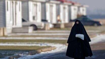 אישה מ"לב טהור" ובנותיה באונטריו, קנדה. | גטי אימג'ס