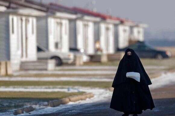אישה מ"לב טהור" ובנותיה באונטריו, קנדה. | גטי אימג'ס