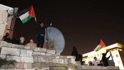 המהומות בשכונת שמעון הצדיק, לפני שנה. | EPA המהומות בשכונת שמעון הצדיק, לפני שנה. | EPA