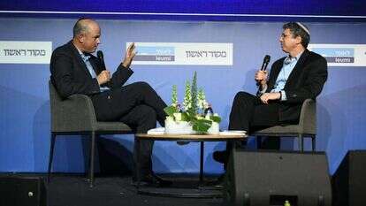 הרב חיים נבון ומיכה גודמן בוועידת מקור ראשון. | שריה דיאמנט