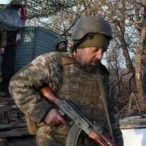 כוחות אוקראינים מתכוננים לקרב. | AFP