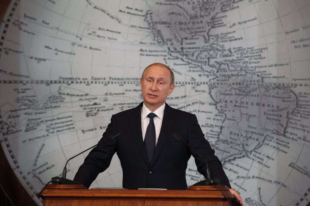 פוטין בהרצאה בחברה הגיאוגרפית בסנט־פטרבורג, 2015. | גטי אימג'ס