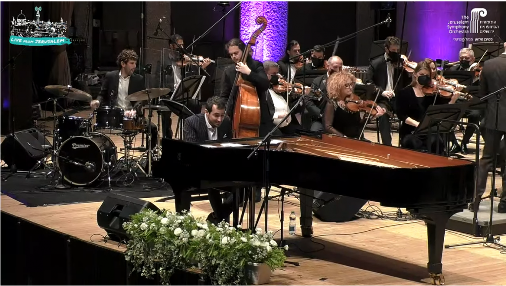 פרשנות מודרנית לקלסיקה. מינטוס עם הסימפונית ירושלים. | מסך מתוך הקונצרט