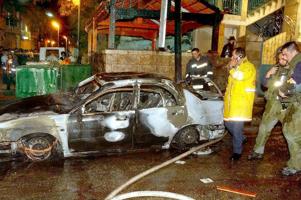 בין משפחת המציל למשפחת הניצול נרקם קשר עמוק. זירת הפיגוע בירושלים. | גטי אימג'ס