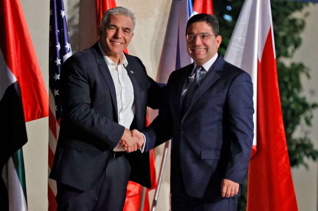 שר החוץ המרוקאי נאסר בוריטה עם ח"כ לפיד, בפסגת הנגב בשנה שעברה. | AFP