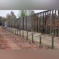 גדר מחנה אושוויץ-בירקנאו. | AFP