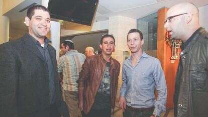 משה קלוגהפט, עמית סגל, עקיבא נוביק ואריאל שנבל בחגיגות גיליון המאה למוסף מוצש, 2013 | מרים צחי