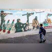 ציור קיר של חמאס ברצועת עזה. | AFP