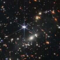 שדה כוכבים וגלקסיות. התמונה הראשונה מטלסקופ החלל ג'יימס וב. | AFP