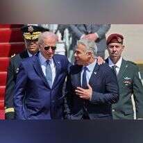 לפיד עם ביידן לאחר נחיתתו בישראל, שלשום. | AFP