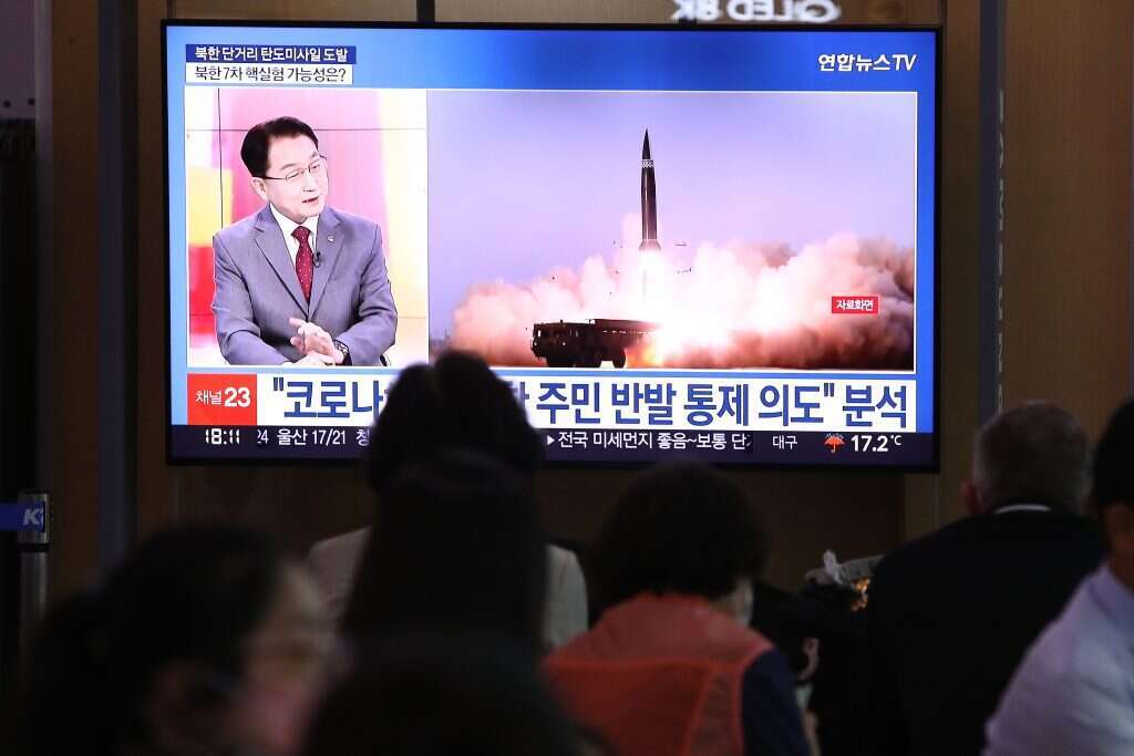 שידור טלוויזיה של ניסוי טילים צפון־קוריאני. | גטי אימג'ס