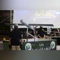 פעיל חמאס ליד אחד מכלי הטיס הבלתי מאוישים. | AFP